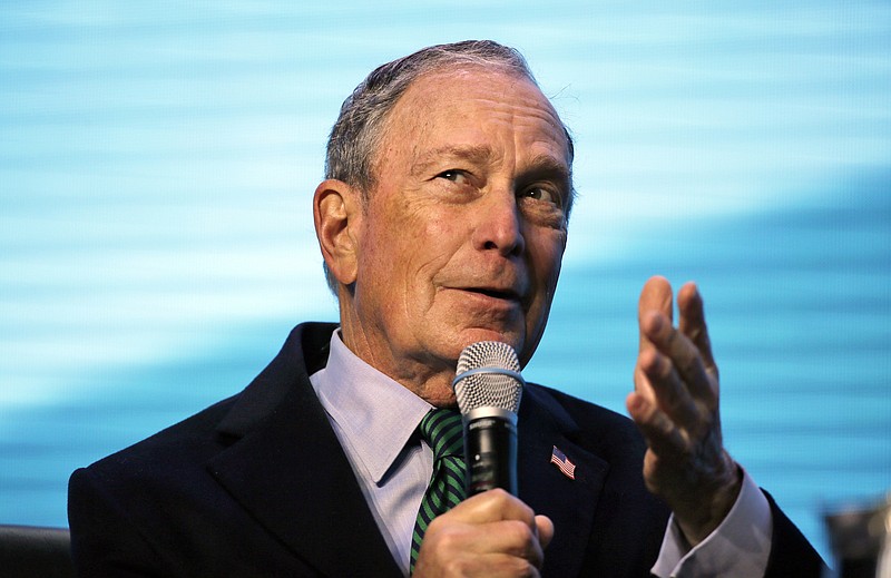 Democratic Presidential candidate and former New York City Mayor Michael Bloomberg gestures while taking part in an on-stage conversation with former California Gov. Jerry Brown at the American Geophysical Union fall meeting Wednesday, Dec. 11, 2019, in San Francisco. Bloomberg made his first visit to California as a Democratic presidential candidate, appearing earlier with the mayor of Stockton who's championed universal basic income. Bloomberg and Brown talked about America's Pledge, bringing together leaders to ensure the U.S. remains a global leader in reducing emissions and delivering the goals of the Paris Agreement. (AP Photo/Eric Risberg)