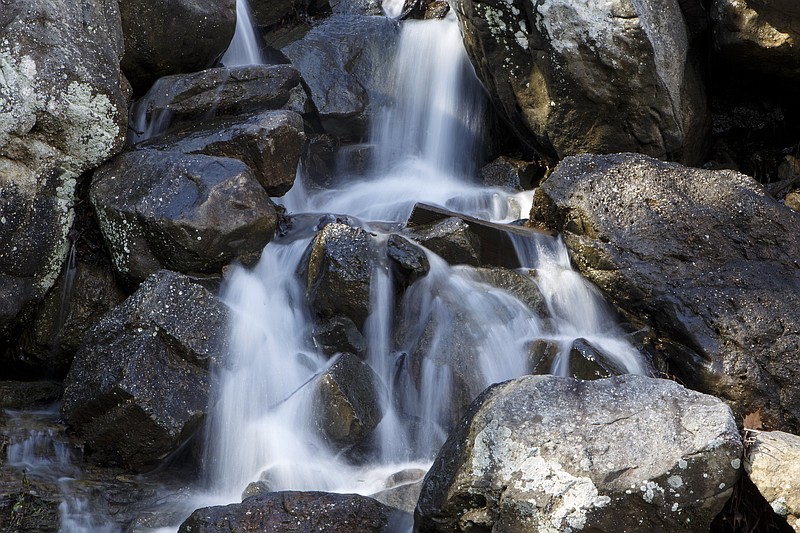 Water flows off of rocks on Thursday, Jan. 24, 2019, in Lookout Mountain, Tenn. / Staff photo by C.B. Schmelter