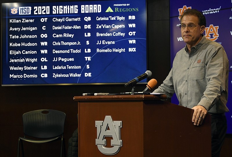 Auburn football coach Gus Malzahn discusses his early signees during a news conference Wednesday. The Tigers have a class so far that has been ranked as high as fifth nationally by ESPN, and it's headed by five-star running back Cartavious "Tank" Bigsby. / Auburn photo by Todd Van Emst