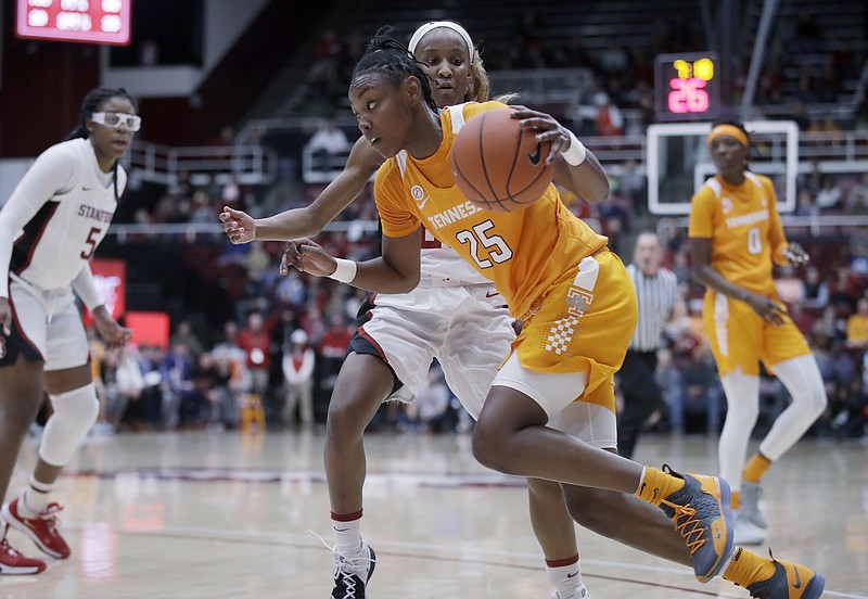 Tennessee's Jordan Horston dribbles past Stanford's Kiana Williams during the first half of Wednesday night's game in Stanford, Calif. / AP photo by Ben Margot