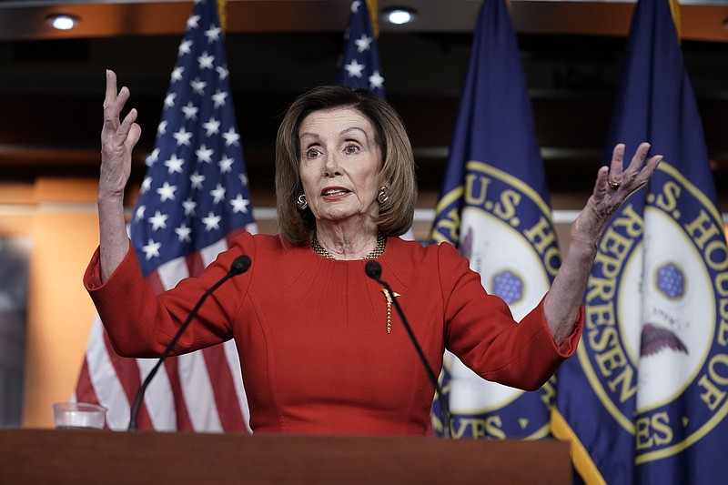 House Speaker Nancy Pelosi, D-Calif., meets with reporters at the Capitol in Washington, Thursday, Dec. 19, 2019, on the day after the House of Representatives voted to impeach President Donald Trump on two charges, abuse of power and obstruction of Congress. (AP Photo/J. Scott Applewhite)