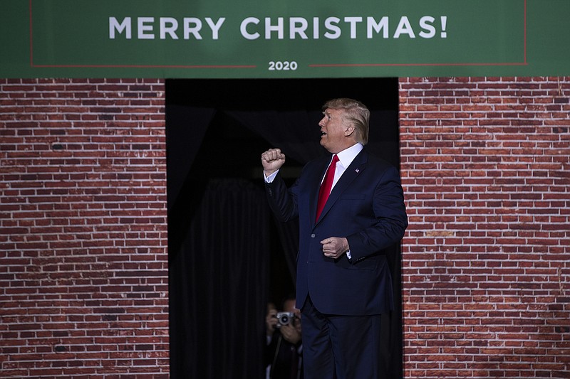 In this Wednesday, Dec. 18, 2019, file photo, President Donald Trump speaks during a campaign rally at Kellogg Arena, Wednesday, Dec. 18, 2019, in Battle Creek, Mich. (AP Photo/Evan Vucci, File)