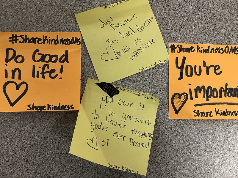 A locker at Ooltewah Middle School is covered with encouraging notes placed anonymously by students. The notes were inspired by random messages of kindness students wrote on cans collected for a school food drive. / Contributed photo by Jamie Stephens