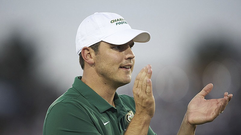 AP file photo by Brian Westerholt / Charlotte football coach Will Healy, whose 49ers played at Clemson last season and will open 2020 at Tennessee, will be the featured speaker for the upcoming 'Night of Impact Banquet' benefiting the Fellowship of Christian Athletes. 