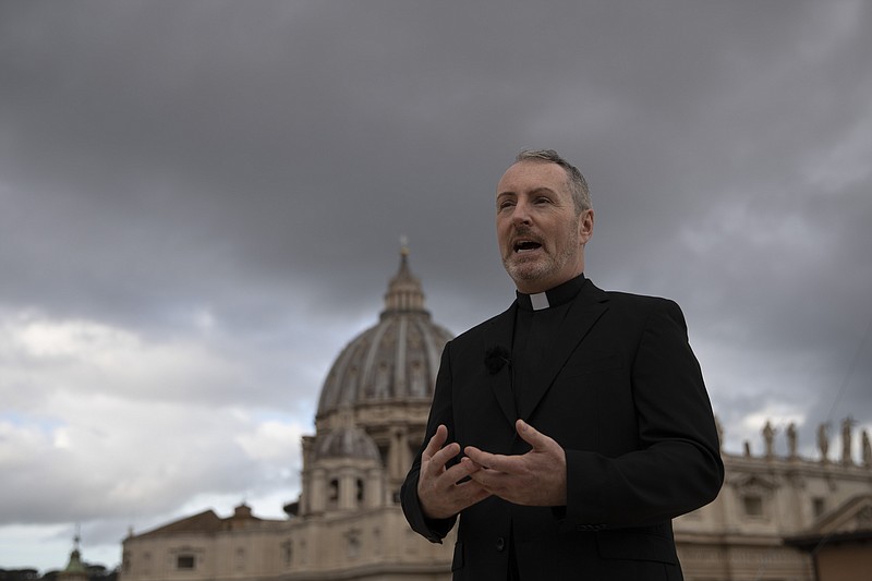 In this Monday, Dec. 9, 2019 photo, Monsignor John Kennedy, the head of the Congregation for the Doctrine of the Faith discipline section, speaks during an interview on the terrace of the section's offices at the Vatican. "We're effectively seeing a tsunami of cases at the moment, particularly from countries where we never heard from (before)," Kennedy said, referring to allegations of abuse that occurred for the most part years or decades ago. (AP Photo/Alessandra Tarantino)