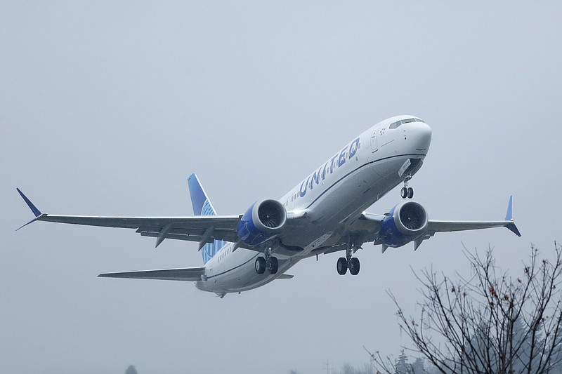 In this Dec. 11, 2019, file photo a United Airlines Boeing 737 Max airplane takes off in the rain at Renton Municipal Airport in Renton, Wash. United Airlines says the Boeing 737 Max has been pulled from its flight schedule until June, the latest in a string of troubling news plaguing the airplane manufacturer. (AP Photo/Ted S. Warren, File)