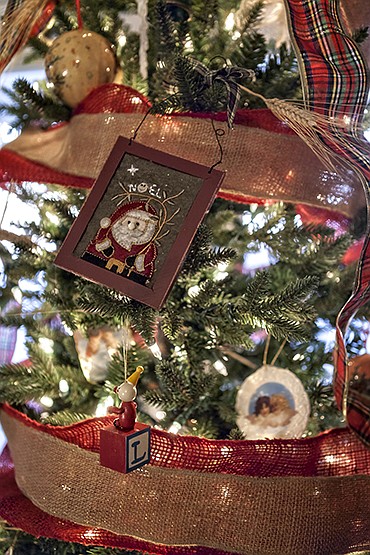 Ornaments are shown on a Christmas tree. / Contributed photo