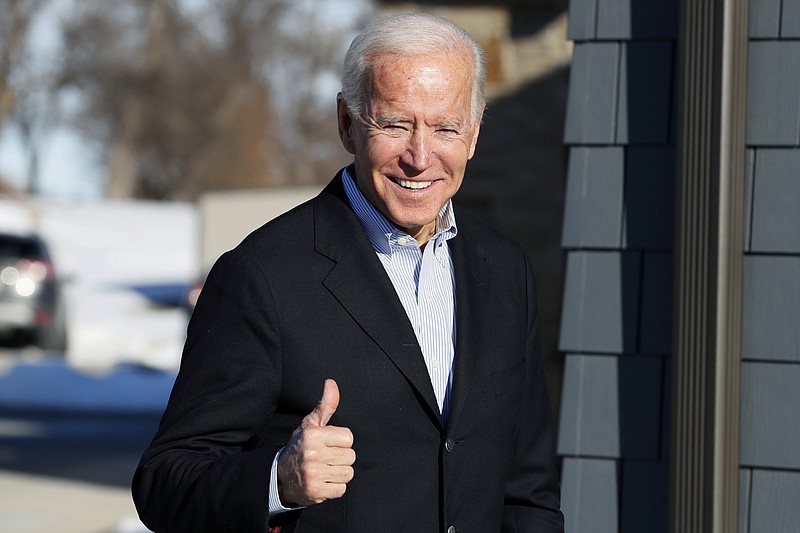 FILE - In this Dec. 2, 2019, file photo, Democratic presidential candidate former Vice President Joe Biden arrives at a stop on his bus tour, in Emmetsburg, Iowa. Joe Biden’s presidential bid got a boost Monday from one of the leading Latinos in Congress, with the chairman of the Hispanic Caucus' political arm endorsing the former vice president as Democrats’ best hope to defeat President Donald Trump. (AP Photo/Charlie Neibergall, File)