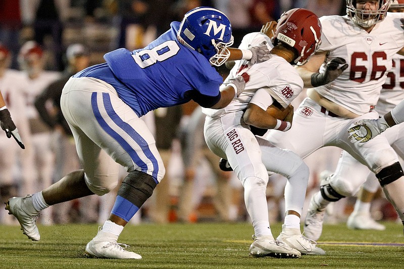 McCallie's Jay Hardy, left, sacks MBA's Marcel Reed during the Division II-AAA BlueCross Bowl state title game on Dec. 5 at Tennessee Tech in Cookeville. / Staff photo by C.B. Schmelter