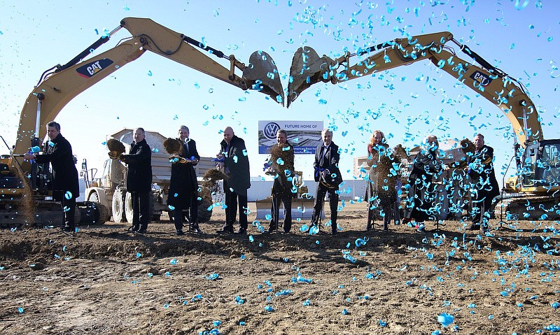 Staff photo by Erin O. Smith / Tennessee officials, Chattanooga officials and Volkswagen officials pose for a photo during the groundbreaking event for the Volkswagen electric vehicle facility at the Volkswagen plant Wednesday, November 13, 2019 in Chattanooga, Tennessee. 