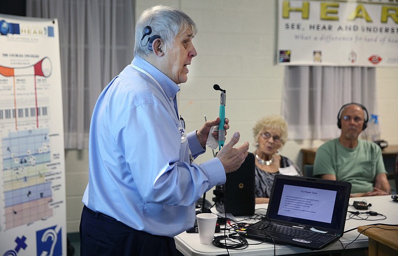 David M. Harrison, a hearing loss support specialist, speaks to a group during a Hear Now hearing loss support class Wednesday, July 19, 2017, at Oakwood Baptist Church in Chattanooga, Tenn. The class gives those with hearing loss a place to go to develop coping skills and improve communication. / Staff photo by Erin O. Smith