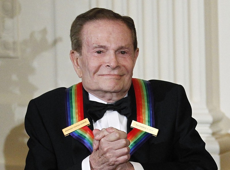 FILE - In this Dec. 5, 2010, file photo, composer Jerry Herman, one of the recipients of the 2010 Kennedy Center Honors is introduced during a reception in the East Room of the White House in Washington. Herman, the Tony Award-winning composer behind "Hello, Dolly!" and "La Cage aux Folles," has died at age 88. (AP Photo/Manuel Balce Ceneta, File)

