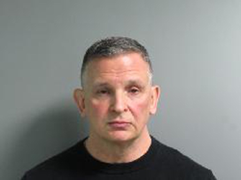 This undated photo obtained from the Maryland Department of Public Safety and Correctional Services in December 2019 shows Richard J. Poster. Poster served time for possessing child pornography, violated his probation by having contact with children, admitted masturbating in the bushes near a church school and in 2005 was put on a sex offender registry. And yet the former Catholic priest was only just in December 2019 added to a list of clergy members credibly accused of child sexual abuse -- after The Associated Press asked why he was not included. (Maryland Department of Public Safety and Correctional Services via AP)