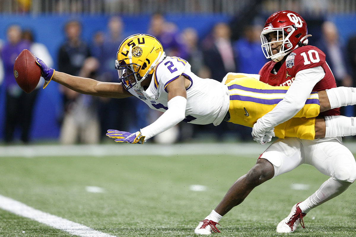 December 28, 2019: LSU's Joe Burrow (9) delivers a pass during the  Chick-Fil-A Peach Bowl - a College Football Playoff Nationall Semifinal -  featuring the Oklahoma Sooners and the LSU Tigers, played