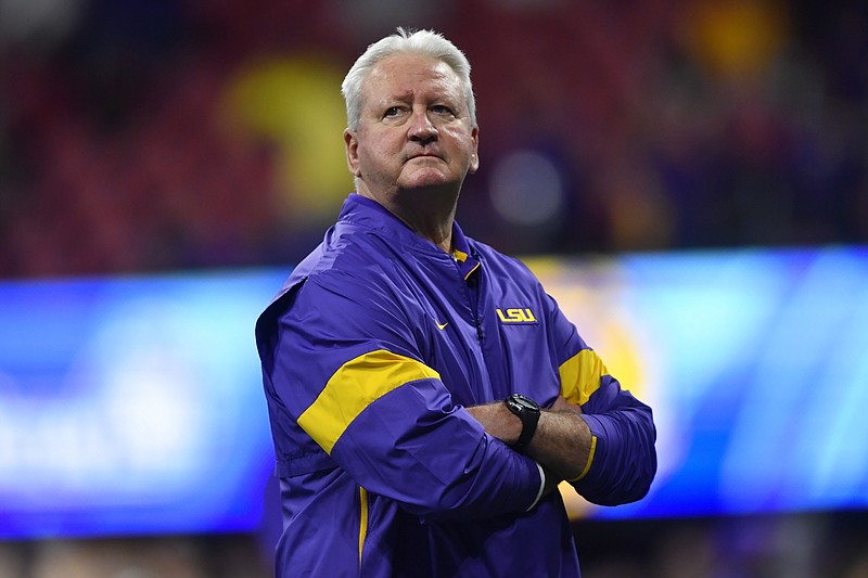 LSU offensive coordinator Steve Ensminger watches as the Tigers warm up for their Peach Bowl national semifinal against Oklahoma on Saturday in Atlanta. / AP photo by John Amis