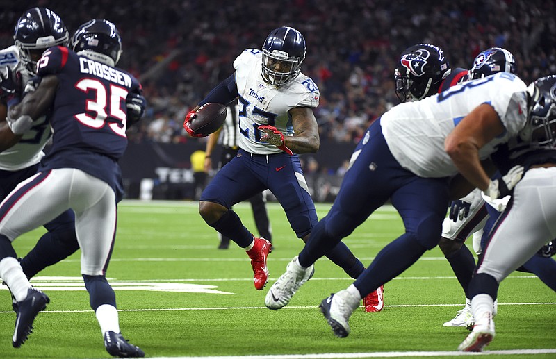 Tennessee Titans running back Derrick Henry heads to the end zone for a touchdown during the second half of Sunday's road game against the Houston Texans. Henry scored three touchdowns and rushed for 211 yards as the Titans won 35-14 to clinch a playoff berth for the second time in three seasons. / AP photo by Eric Christian Smith