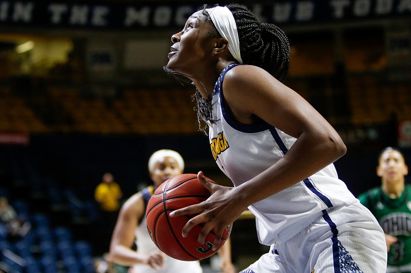 UTC forward Eboni Williams eyes the basket during a Dec. 29 game against Ohio at McKenzie Arena. Williams had 14 rebounds in the Mocs' loss Thursday night at Samford. / Staff photo by C.B. Schmelter