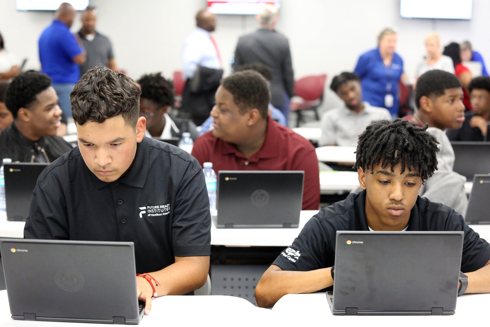 Staff photo by Erin O. Smith / Diego Cortez and Brandon Sanford, students at Tyner, work on Chromebooks in the new Learning Lab at Tyner High Academy Tuesday, August 13, 2019 in Chattanooga, Tennessee. The lab is part of the school's Future Ready Institute, the EPB Institute of Technology and Networking.