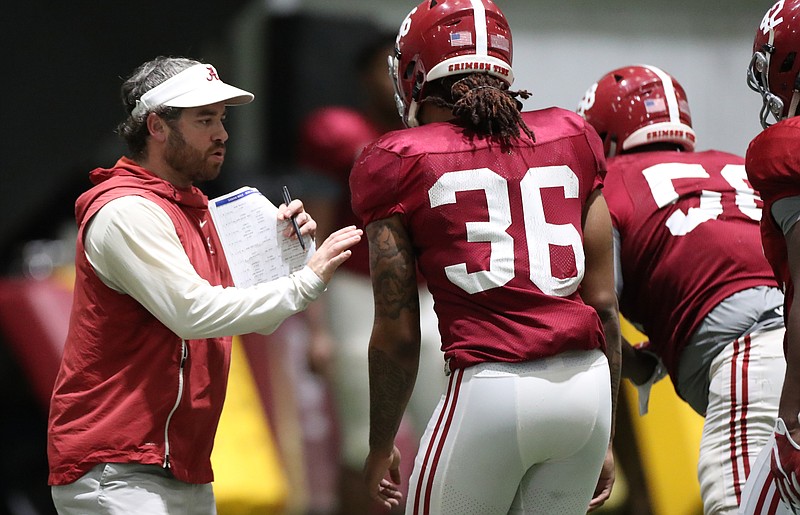 Alabama first-year defensive coordinator Pete Golding works with Crimson Tide defenders during an indoor practice this past weekend in Orlando in preparation for Wednesday's Citrus Bowl against Michigan.