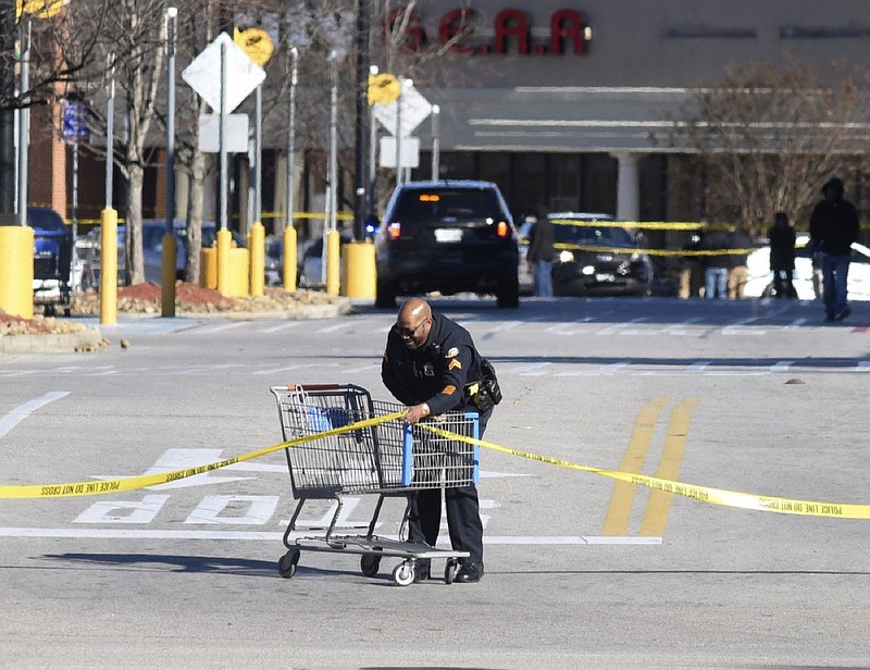 Staff photo by Tim Barber/ Chattanooga Police block all entrances to 490 Greenway View Dr. at 1:30 p.m. Tuesday, Dec. 31, 2019, to the Brainerd Walmart parking lot after finding two people shot. Both were transported by ambulance. One person had life-threatening injuries, according to Victor Miller, PIO for homicide division.
