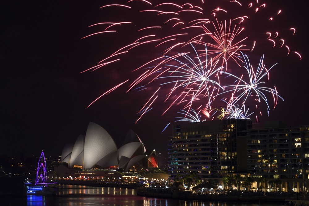 The 9pm Family fireworks explode over the Sydney Opera House and Sydney Harbour Bridge on Sydney Harbour during New Year's Eve celebrations in Sydney, Tuesday, December 31, 2019. (AAP Image for City of Sydney/Dean Lewins)