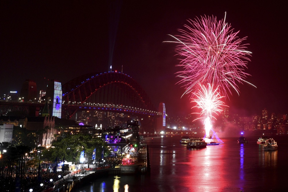 The 9pm Family fireworks explode over the Sydney Opera House and Sydney Harbour Bridge on Sydney Harbour during New Year's Eve celebrations in Sydney, Tuesday, December 31, 2019. (AAP Image for City of Sydney/Dean Lewins)