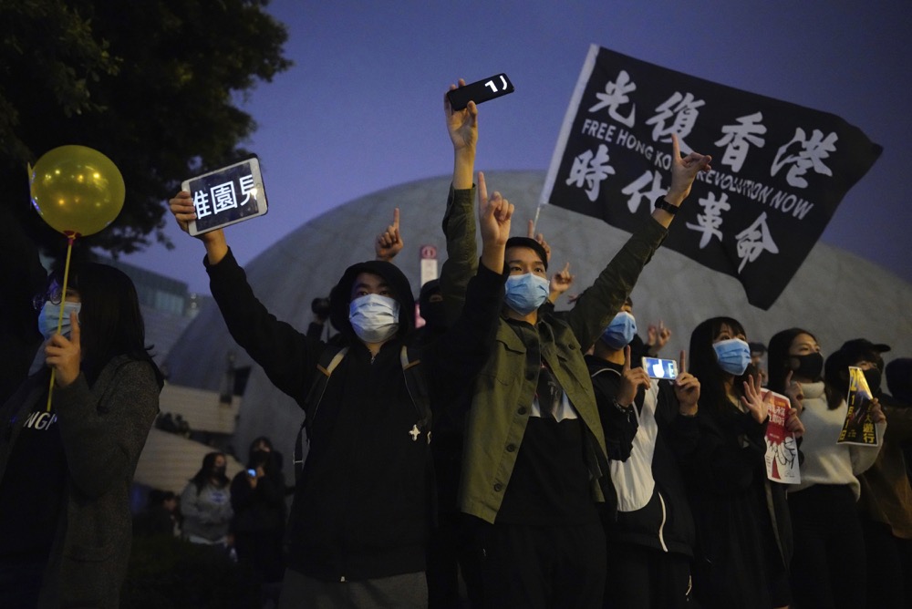 Protesters gather during a demonstration in Hong Kong, Tuesday, Dec. 31, 2019. Chinese President Xi Jinping in a New Year's address Tuesday has called for Hong Kong to return to stability following months of pro-democracy protests that began in June over a proposed extradition law, and have spread to include other grievances and demands for more democracy.(AP Photo/Vincent Yu)