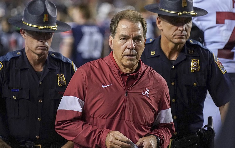 AP photo by Chris Shimek / Alabama football Nick Saban walks off the field after the Crimson Tide's loss to host Auburn on Nov. 30, 2019.