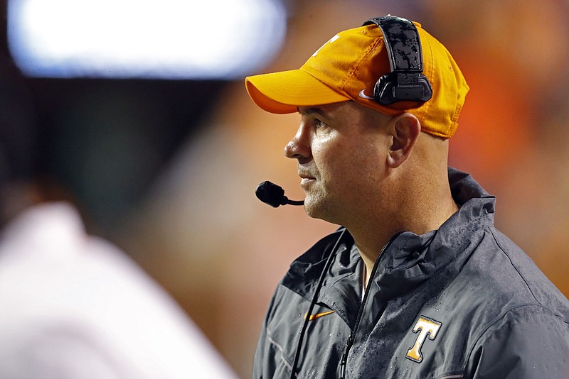 Tennessee head coach Jeremy Pruitt watches the first half of an NCAA college football game against Vanderbilt, Saturday, Nov. 30, 2019, in Knoxville, Tenn. (AP Photo/Wade Payne)