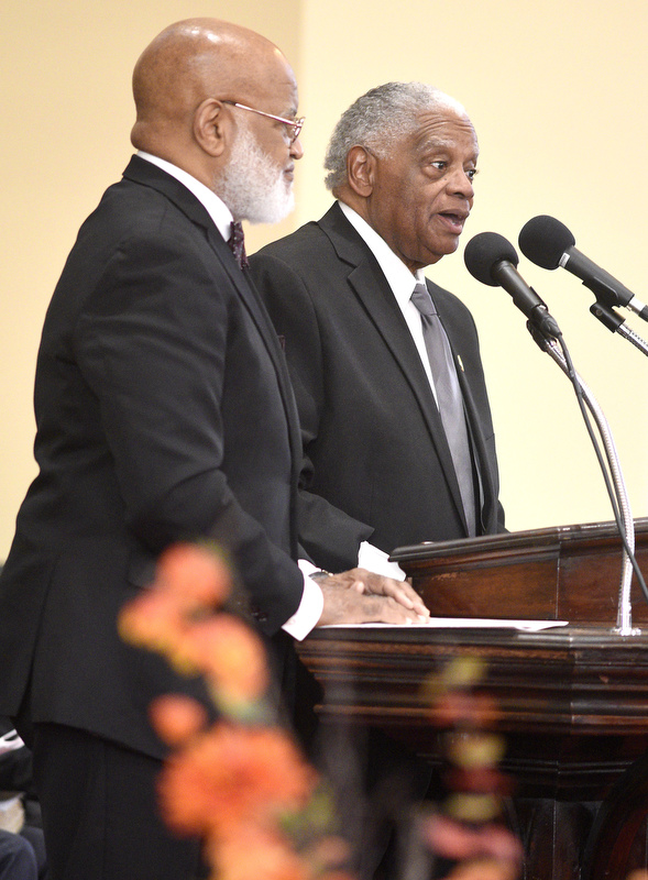 Staff Photo by Robin Rudd/   From left, ceremony hosts, James Mathis and George Calhoun of the NAACP, welcome participants.
