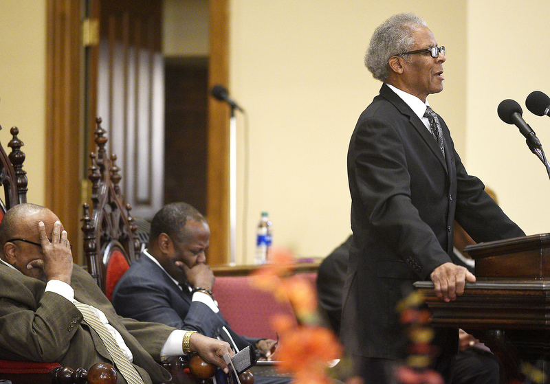 Staff Photo by Robin Rudd/   Reverend Fred Martin, Senior Pastor of Southside Church of Christ, right, offers prayer, while, from left, keynote Speaker Reverend Dr. Jay Trimble, Senior Pastor of Prospect Baptist Church, and host pastor Reverend Dr. Terry Ladd, III, Senior Pastor of First Baptist Church, join him.