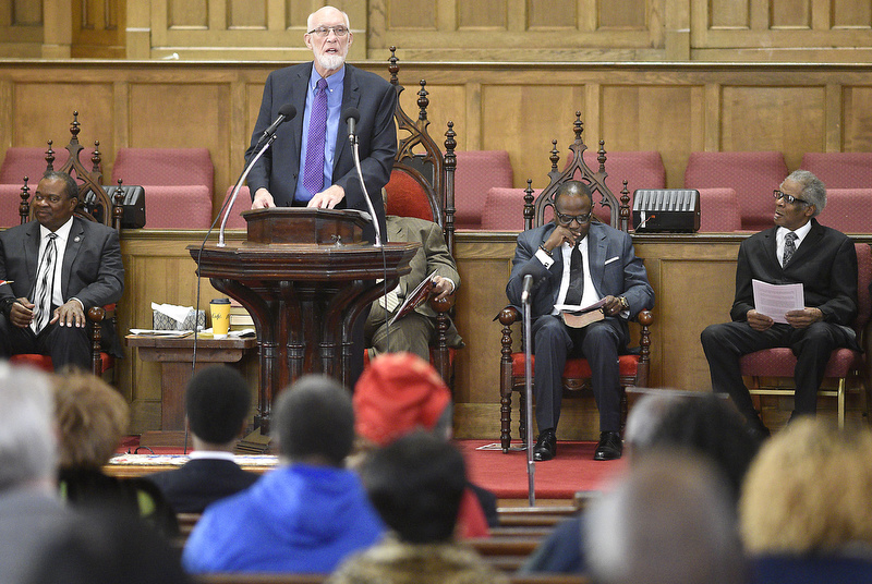 Staff Photo by Robin Rudd/   Community Activist Franklin McCallie speaks on the meaning of the occasion.