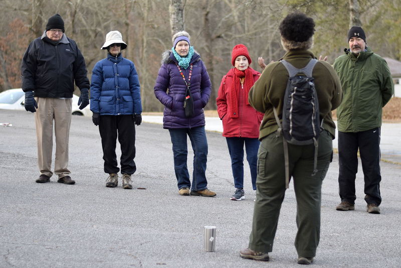 Staff Photo by Robin Rudd/   Hikers listen as Kahla Stewart with Appalachia CARES/AmeriCorps and Booker T. Washington State Park outlines the day's walk.  Booker T. Washington State Park kicked off the new year and decade hosting a two-mile first day hike on January 1, 2020.
