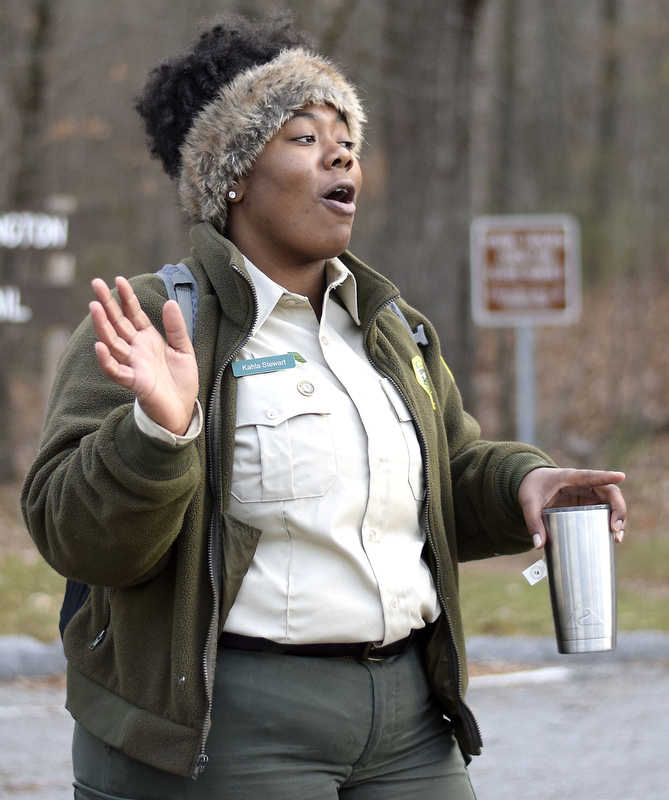 Staff Photo by Robin Rudd/   Kahla Stewart with Appalachia CARES/AmeriCorps and Booker T. Washington State Park speaks to the hikers before then began their trek.  Booker T. Washington State Park kicked off the new year and decade hosting a two-mile first day hike on January 1, 2020.