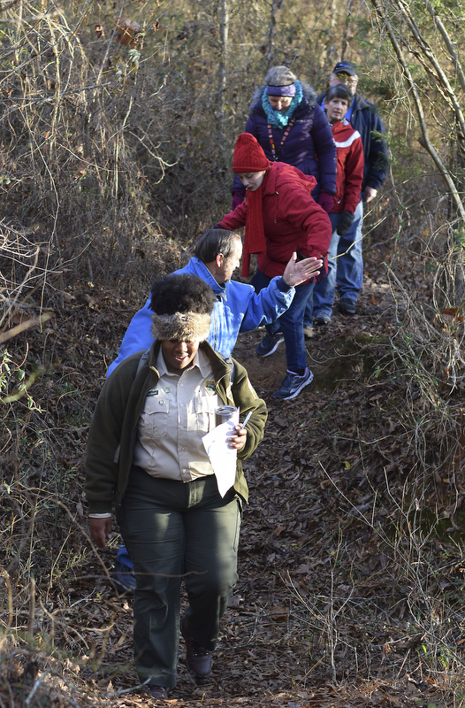 Staff Photo by Robin Rudd/   Kahla Stewart with Appalachia CARES/AmeriCorps and Booker T. Washington State Park leads the hike.  Booker T. Washington State Park kicked off the new year and decade hosting a two-mile first day hike on January 1, 2020.