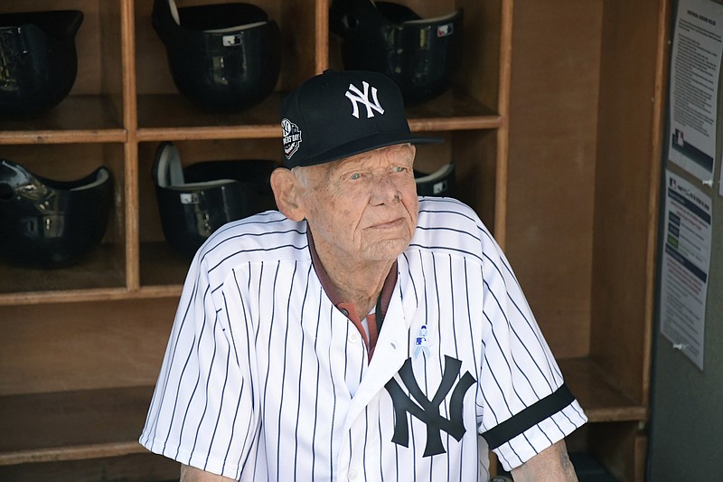 Don Larsen sits in the dugout before the New York Yankees' Old-Timers' Day game on June 17, 2018. / AP photo by Bill Kostroun