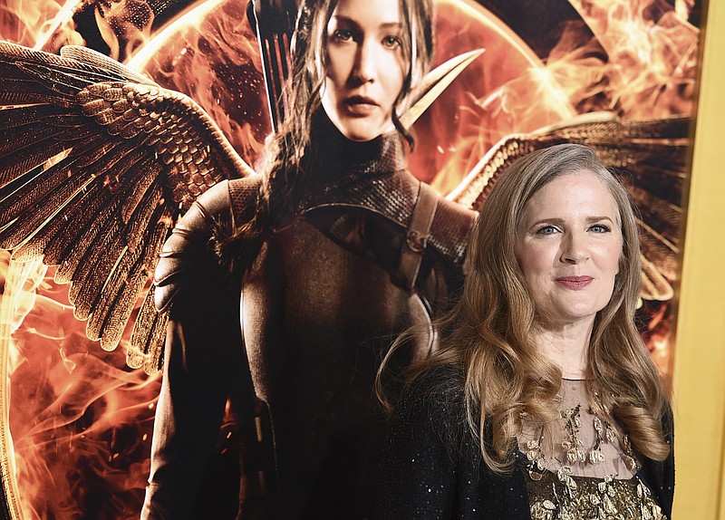 FILE - In a Monday, Nov. 17, 2014 file photo, Suzanne Collins arrives at the Los Angeles premiere of "The Hunger Games: Mockingjay - Part 1" at the Nokia Theatre L.A. Live. A decade after seemingly wrapping up "The Hunger Games," Suzanne Collins is bringing readers back to Panem. A prequel, set 64 years before the beginning of her multimillion-selling trilogy, is scheduled for release on May 19, 2020. (Photo by Jordan Strauss/Invision/AP, File)


