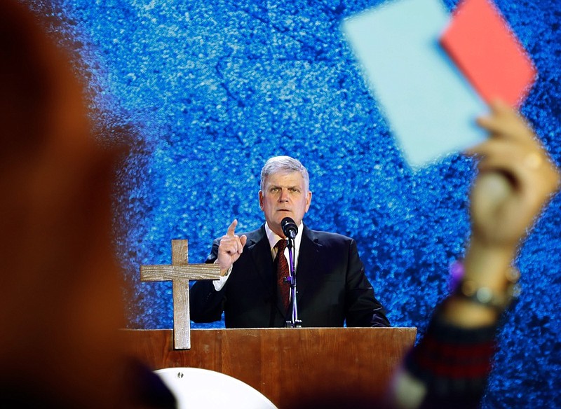 FILE - In this Friday, Dec. 8, 2017, file photo, evangelical preacher Franklin Graham speaks in Hanoi, Vietnam. Graham, son of the late Rev. Billy Graham and one of President Donald Trump's most stalwart evangelical supporters, pointed to Trump's record on abortion as a key driver of the president's support from his religious community. "I don't think evangelicals are united on every position the president takes or says, but they do recognize he is the most pro-life-friendly president in modern history," Graham said in a December 2019 interview. "He has appointed conservative judges that will affect my children and grandchildren's lives, long after he's gone." (AP Photo/Hau Dinh, File)


