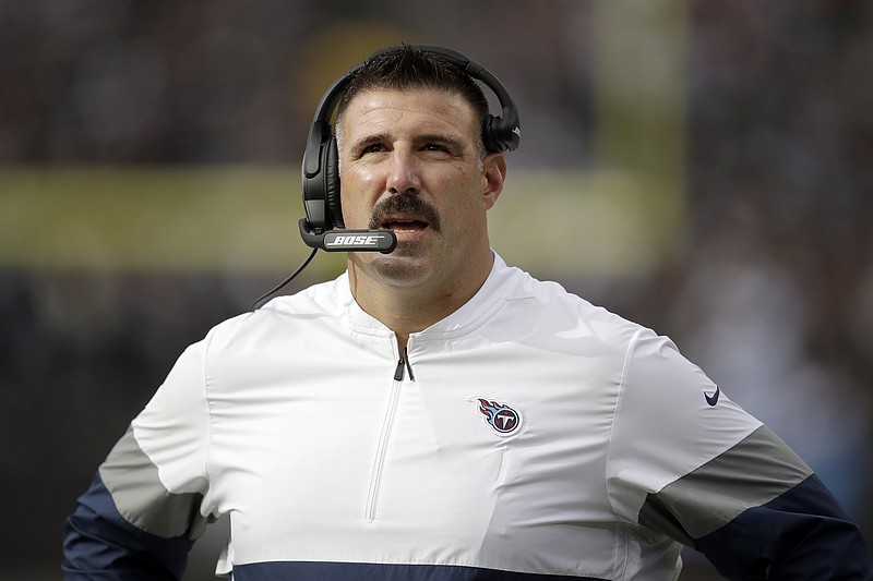 AP photo by Ben Margot / Tennessee Titans coach Mike Vrabel watches the first half of his team's road game against the Oakland Raiders on Dec. 8, 2019.