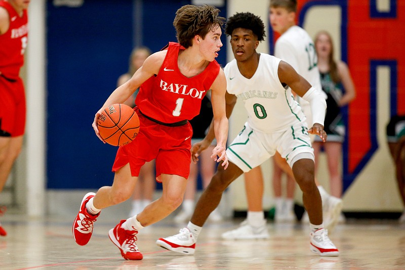 Baylor's Eli Sparkman dribbles the ball during a Best of Preps tournament semifinal against East Hamilton on Friday night at Chattanooga State. / Staff photo by C.B. Schmelter