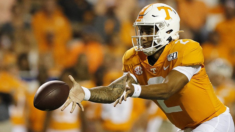 Staff photo by C.B. Schmelter / Tennessee quarterback Jarrett Guarantano pitches the ball during a home game against BYU on Sept. 7, 2019. The Vols lost 29-26 in double overtime.