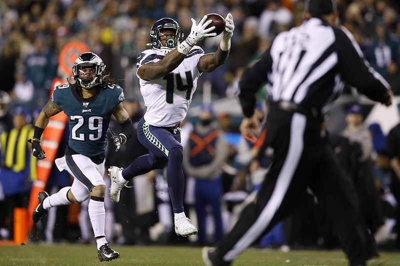 Seattle Seahawks receiver DK Metcalf catches a touchdown pass as the Philadelphia Eagles' Avonte Maddox trails during the second half of a wild-card playoff game Sunday in Philadelphia. / AP photo by Matt Rourke
