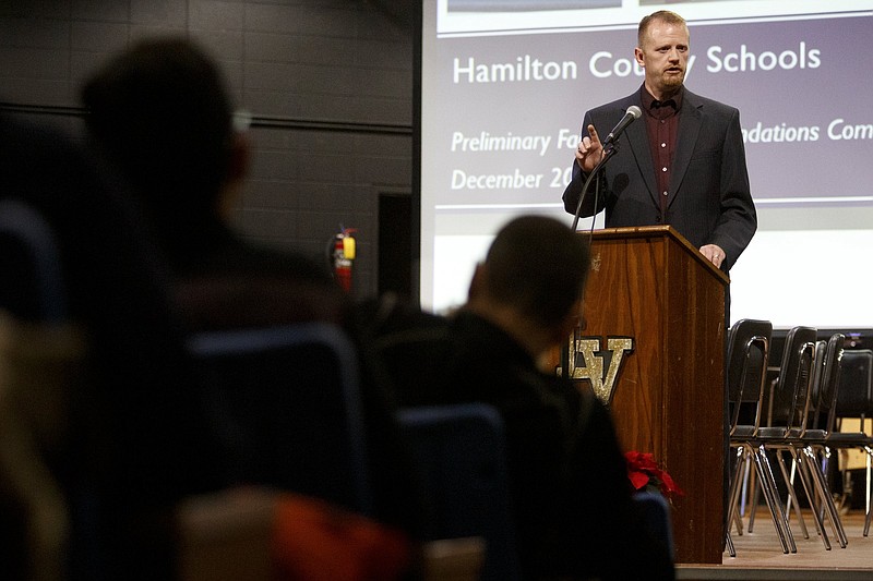 Staff photo by C.B. Schmelter / Dan Schmidt, director of MGT's Education Consulting Group, speaks during a community meeting in the David H. Crawford Theatre at Lookout Valley Middle/High School on Wednesday, Dec. 4, 2019 in Chattanooga, Tenn.