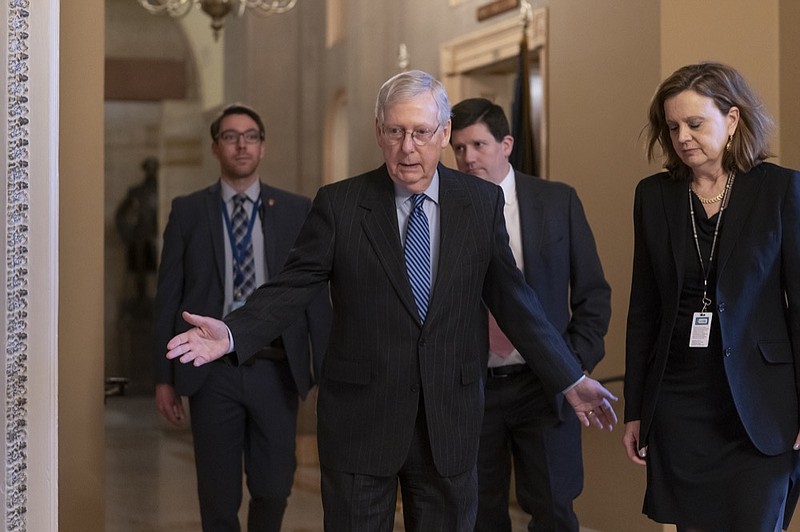 Senate Majority Leader Mitch McConnell, R-Ky., arrives for a closed meeting with fellow Republicans as he strategizes about the looming impeachment trial of President Donald Trump, at the Capitol in Washington, Tuesday, Jan. 7, 2020. (AP Photo/J. Scott Applewhite)


