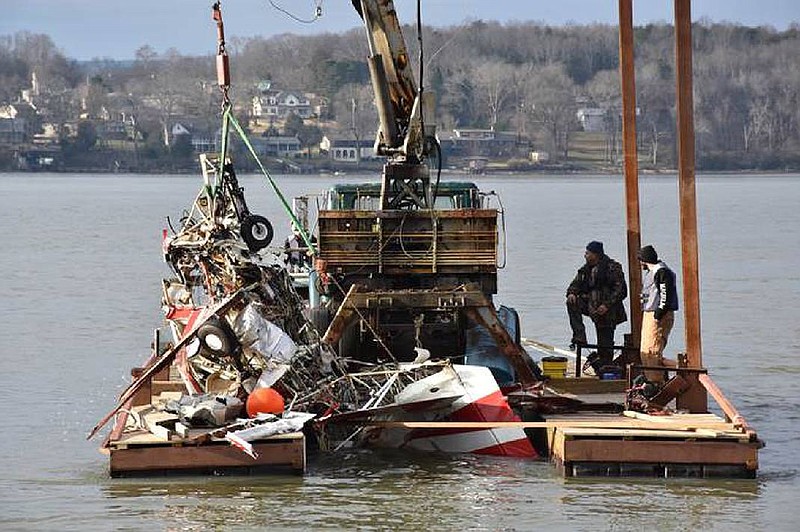 Private contractors recover the wreckage of a small plane that crashed in Chickamauga Lake on Monday, January 7, 2019. / Contributed photo by Hamilton County Sheriff's Office Public Relations Division