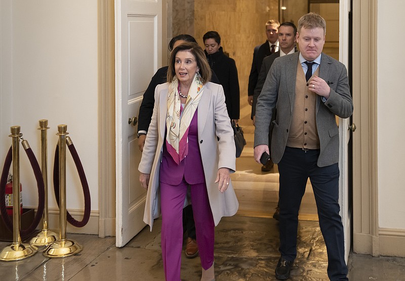 Speaker of the House Nancy Pelosi, D-Calif., arrives at the Capitol in Washington, Tuesday Jan. 7, 2020, as Democrats prepared largely symbolic resolutions under the War Powers Act to limit the president's military actions regarding Iran. (AP Photo/J. Scott Applewhite)