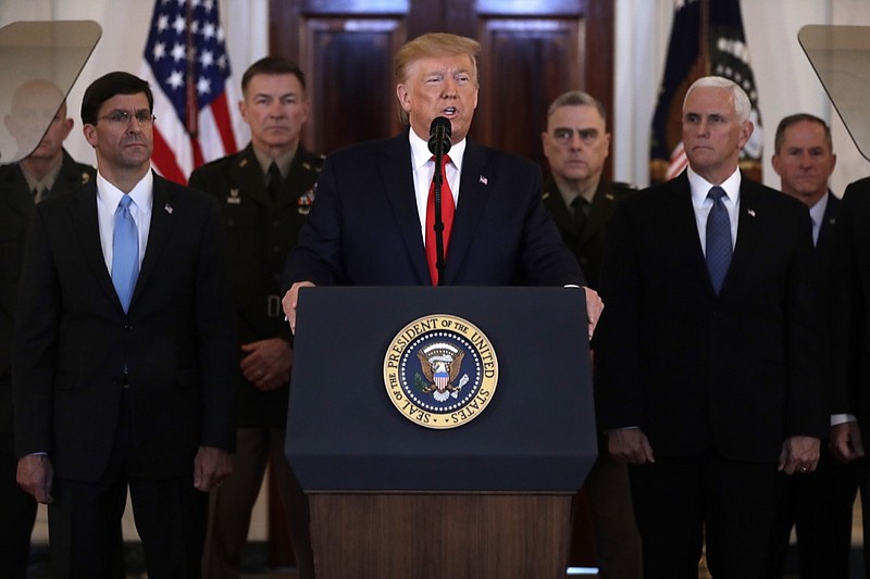 President Donald Trump addresses the nation from the White House on the ballistic missile strike that Iran launched against Iraqi air bases housing U.S. troops, Wednesday, Jan. 8, 2020, in Washington, as Secretary of Defense Mark Esper, Chairman of the Joint Chiefs of Staff Gen. Mark Milley, and Vice President Mike Pence, and look on. (AP Photo/ Evan Vucci)