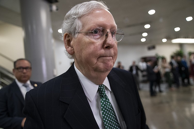 Photo by J. Scott Applewhite of The Associated Press / Senate Majority Leader Mitch McConnell, R-Kentucky, heads to a briefing by Secretary of State Mike Pompeo, Defense Secretary Mark Esper, and other national security officials on the details of the threat that prompted the U.S. to kill Iranian Gen. Qassem Soleimani in Iraq.