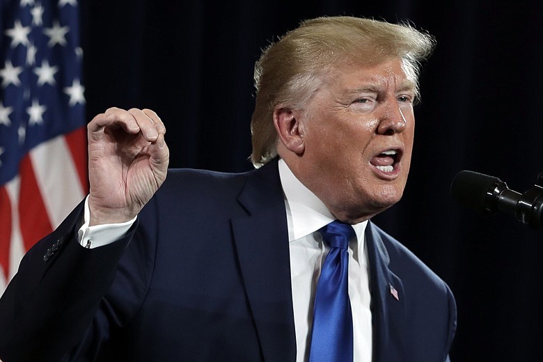 President Donald Trump speaks during the launch of "Black Voices for Trump," at the Georgia World Congress Center, Friday, Nov. 8, 2019, in Atlanta. (AP Photo/ Evan Vucci)