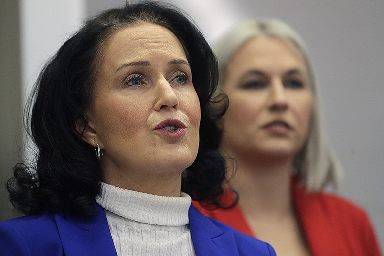 Wendy Murphy, left, legal counsel for Equal Means Equal, faces reporters as Natalie White, right, vice president of the organization, looks on during a news conference, Tuesday, Jan. 7, 2020, in Boston, held to address issues about a lawsuit filed in U.S. District Court. Supporters of the Equal Rights Amendment filed the federal lawsuit in Massachusetts aimed at paving the way for adoption of the long-delayed constitutional amendment. (AP Photo/Steven Senne)